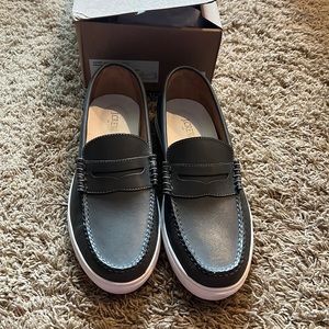 Brand new pair of J Crew, dark gray, leather loafers. Never worn. Size 10.